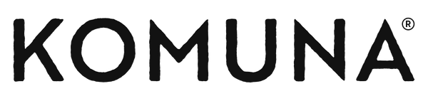 Komuna logo, representing the brand identity of specialty coffee in Denmark.